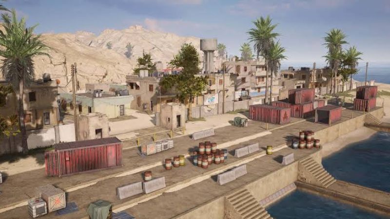 image featuring karakin map in PUBG Mobile with houses having small hills in the background. 